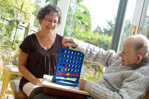 female caring for older man