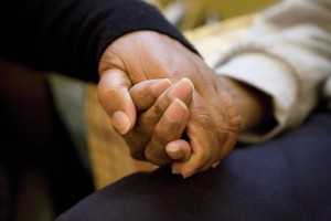 _MG_3446 elderly female carer holding hand of husband copy